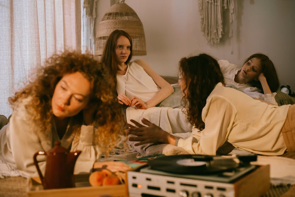 friends listening to vinyl record in cozy living room evening gathering