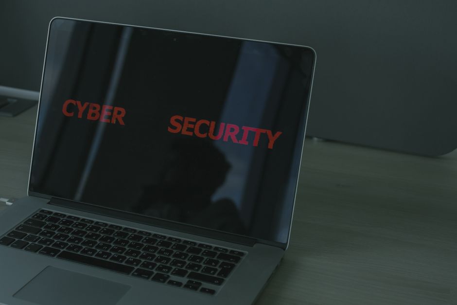 pexels-5483248 person using laptop with cybersecurity privacy concept modern AI firewall